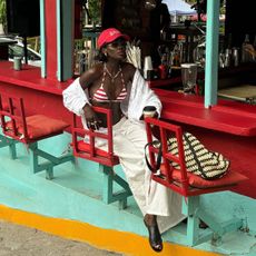 woman wearing bikini and oversized shirt