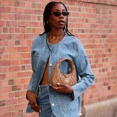 Woman wearing double denim scandi fall fashion trend.